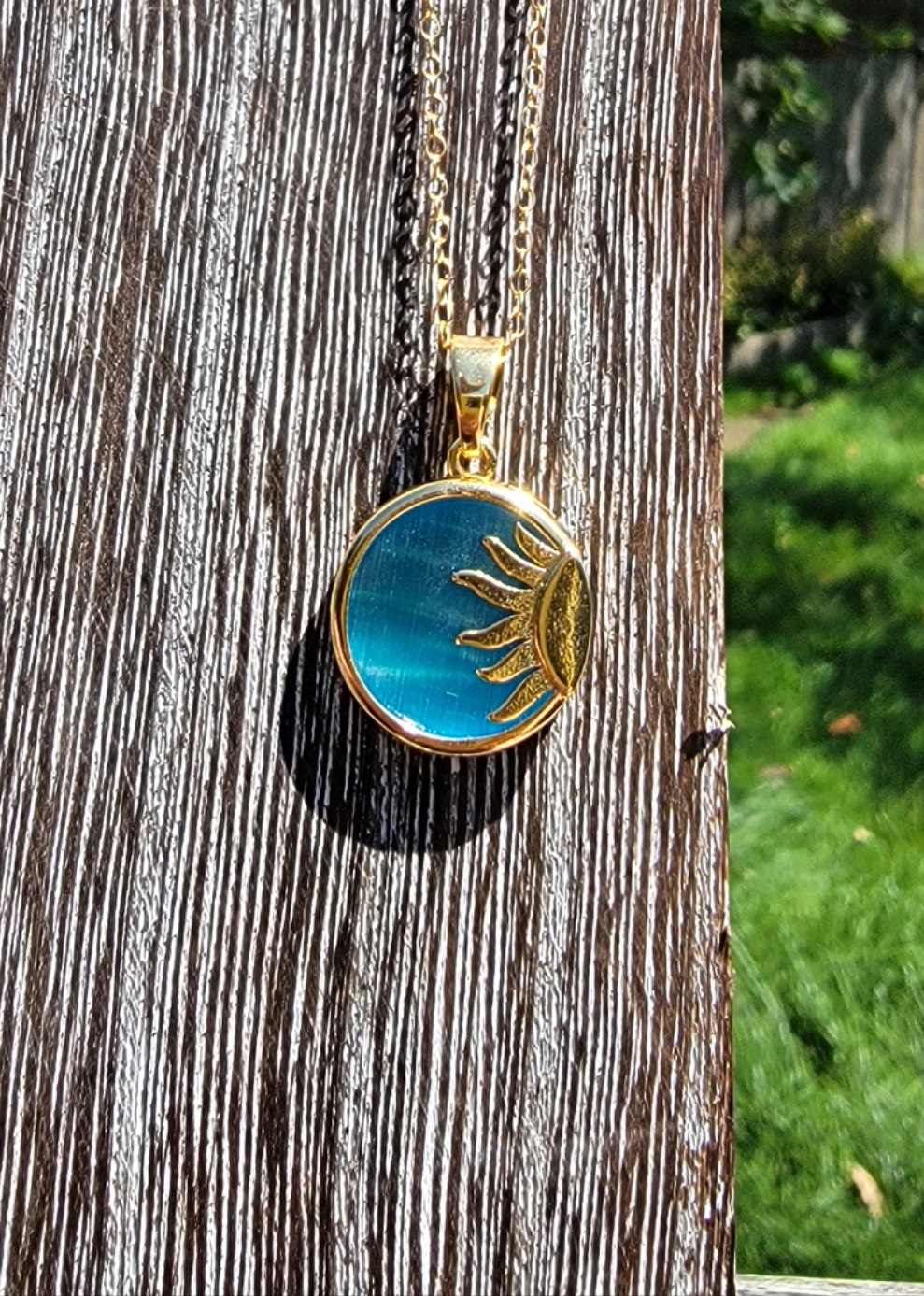 Blue resin, 14k gold-plated, & 14k gold-filled sun pendant